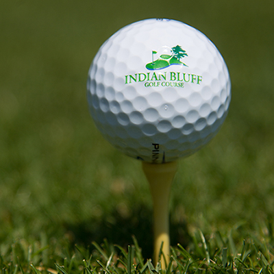 Golf ball with Indian Bluff Logo on tee
